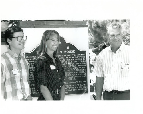 Grant Adamson, Leslie Adamson London, and Ron Rindge with plaque, 1989