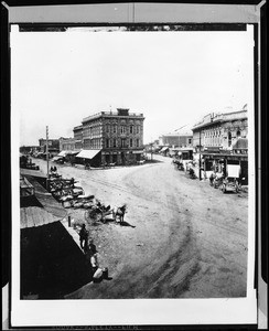 Junction of Spring Street, Main Street and Temple Street looking south from Commercial Street, showing the Temple Block, , 1880