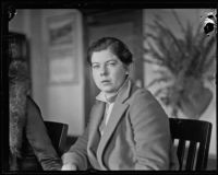 Helen Wilkinson looks to the camera during legal proceedings against Dorothy Mackaye and Paul Kelly, Los Angeles, 1927