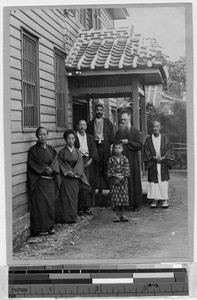 Fr. Sauret with some of his Christians at the door of the mission at Omata, Japan, 1914