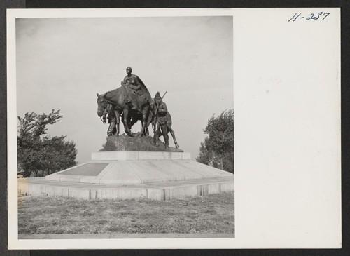 Monument to the Pioneer Mother, one of the many fine pieces of sculpture to be seen in Kansas City public parks. Photographer: Mace, Charles E. Kansas City, Missouri