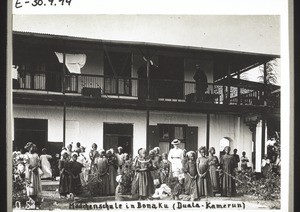 Girls' School in Bonaku (Cameroon) with Miss Bucher in front of the mission house