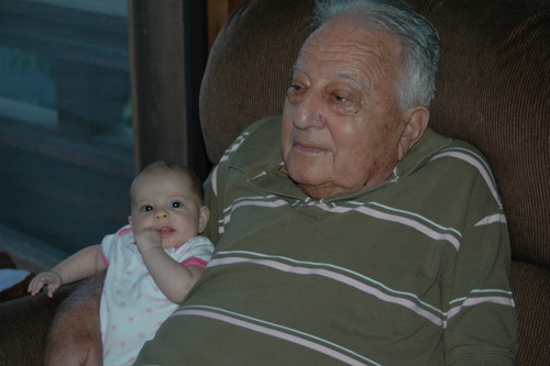Edward D. Goldberg, with one of his grandchildren. Goldberg was a marine chemist at Scripps Institution of Oceanography. Among his most noted work was his identification of tributyltin as a toxic chemical in marine paint fouling California harbors and in the creation of the 1975 EPA-sponsored Mussel Watch program to observe U.S. coastal marine pollution. Circa 2007