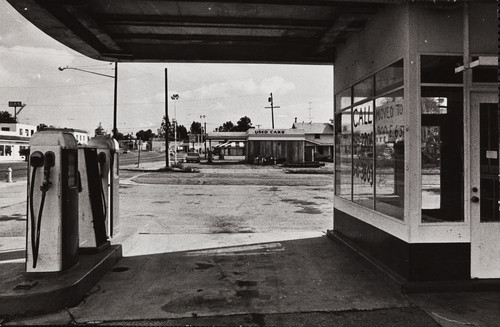 A gas station on the southeast side of 6th Street, the corner of 6th and Egan Sts. Circa 1970
