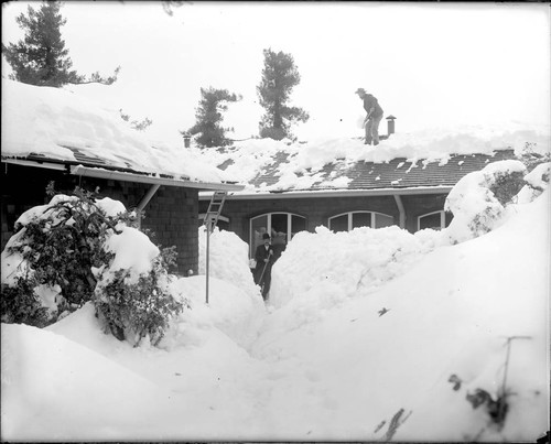Shoveling snow at the Monastery, Mount Wilson Observatory