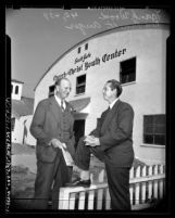 Frank Wood and Reverend Everett Auger outside of South Gate Church of Christ Youth Center, Calif., 1947