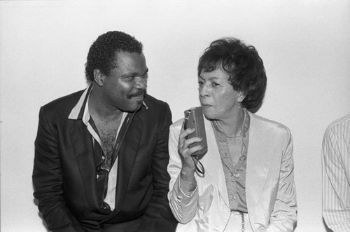 Gertrude Gipson interviewing Billy Preston at the Pied Piper nightclub, Los Angeles, 1984