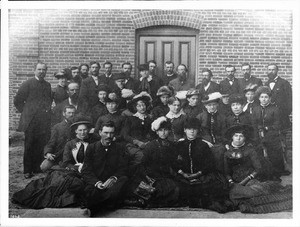 Los Angeles County school teachers posing in front of a brick building (Normal School?), 1884