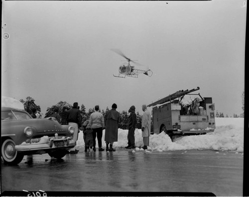 Helicopter taking off for snow survey