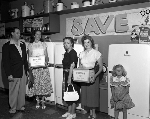 Customers with new toasters, Jessee's Apppliances, Orange County, California, July 2, 1951