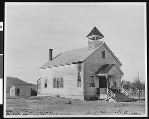 Exterior view of the old school house at Chinese Camp, Tuolumne County, ca.1900-1940