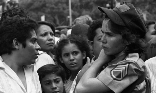 Sandinista woman in a crowd, Managua, 1979