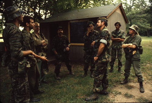 Survival school students await instructions, Liberal, 1982