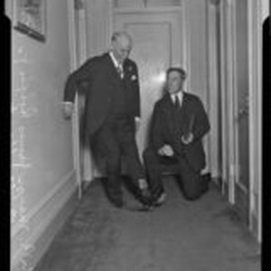 Mayor James Rolph and William S. Hart use their boot jacks, Los Angeles ...