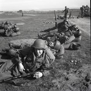 Trainees resting between exercises during basic training at Fort Ord ...