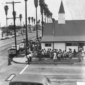Outside church after Watts Riots — Calisphere