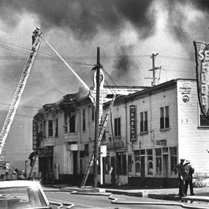 Building in fire during Watts Riots — Calisphere