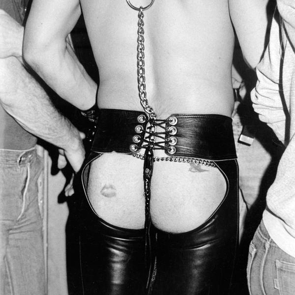 Leather man showing his backside through his chaps — Calisphere