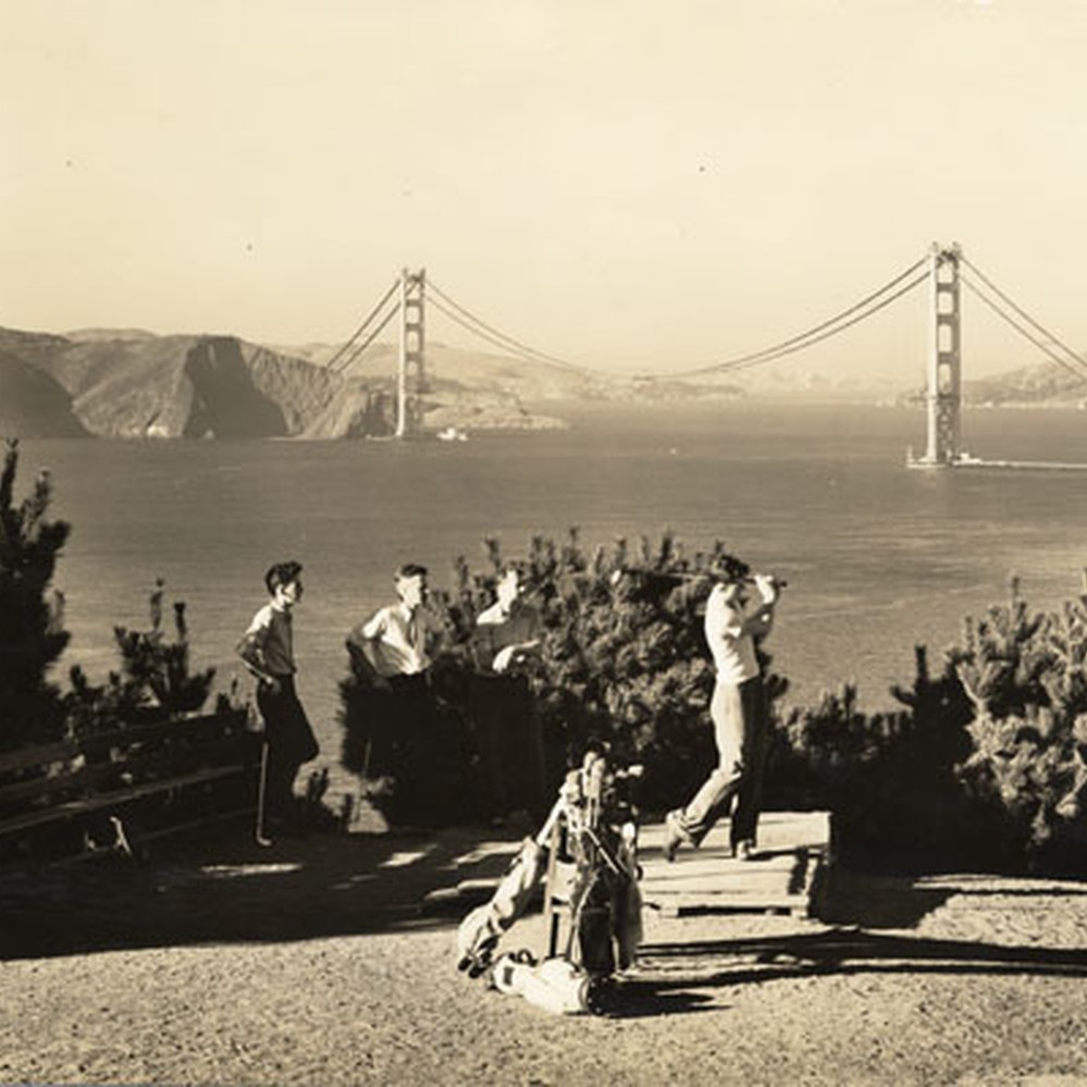 Golfers at Lincoln Park Golf Course, with view of partially