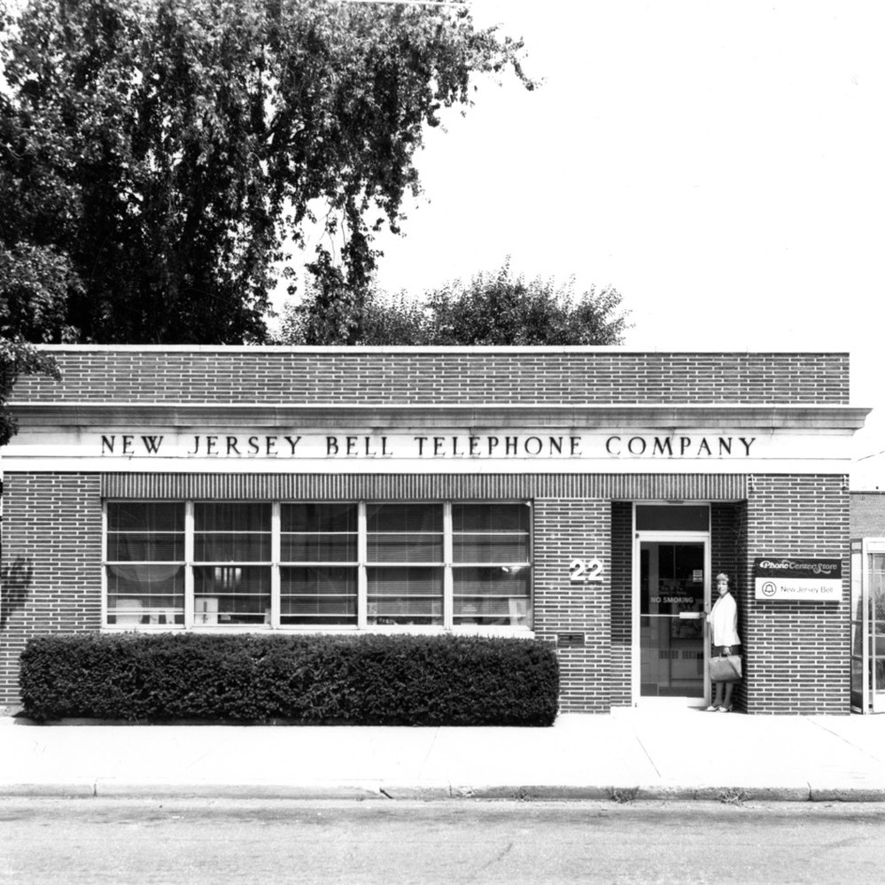 Donna Shimp in front of New Jersey Bell Telephone Company building Calisphere