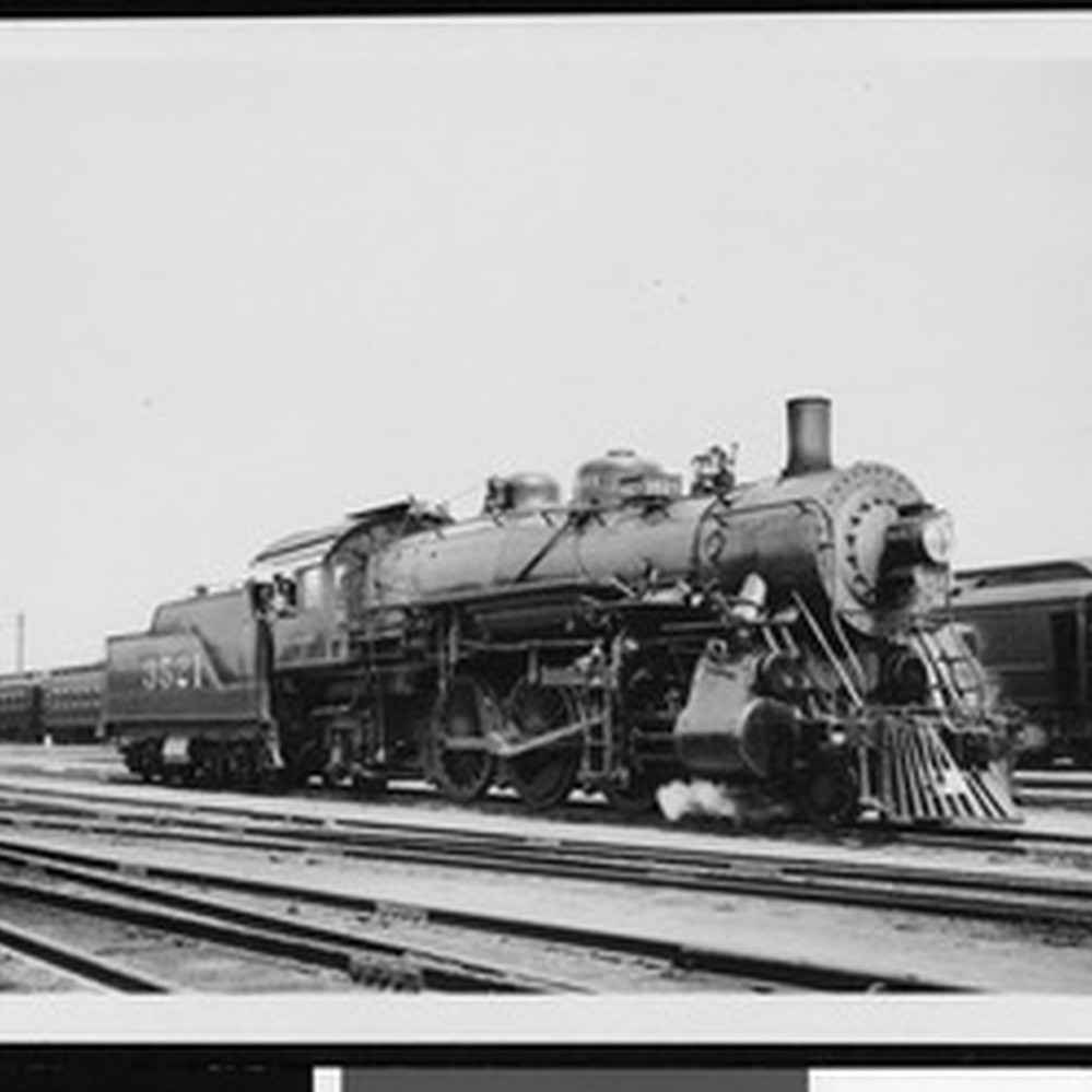 Unidentified locomotive engine at a railroad yard, ca.1920