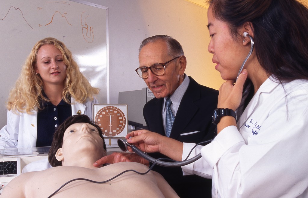 Dr. Berk with medical students. — Calisphere