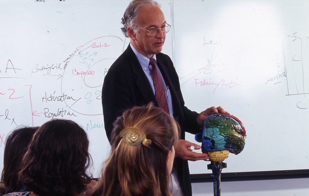 Prof Cooman Professor Carl Cotman, with students. — Calisphere